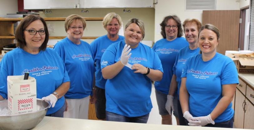 volunteers serving food