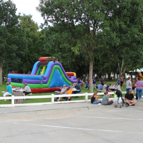 Atkinson City Park with Bounce Houses and crowd